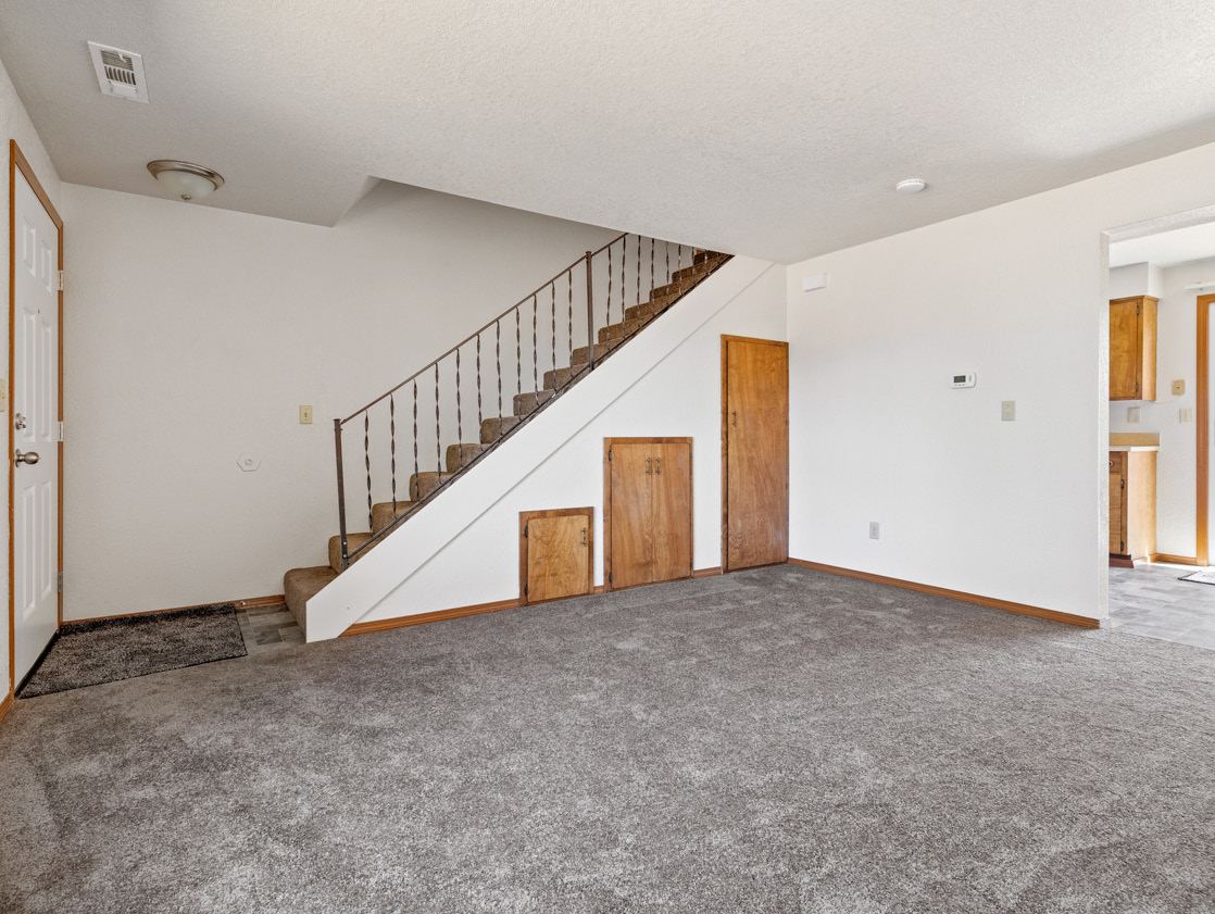 Townhome living area with stairs